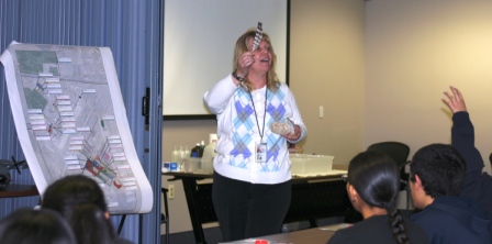Bev Noel involved the students in the STEM presentation by having them identify which bird a feather belonged to.  