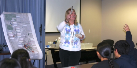 Bev Noel involved the students in the STEM presentation by having them identify which bird a feather belonged to.