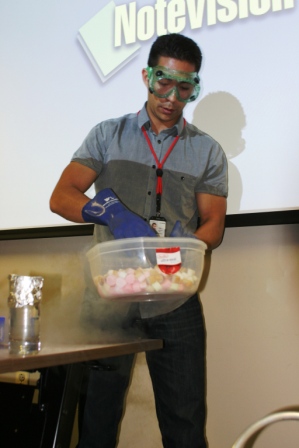 Trainor holds a bowl of marshmallows frozen by liquid nitrogen
