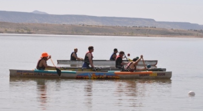 Teams get their canoes lined up to start the race on Cochiti Lake