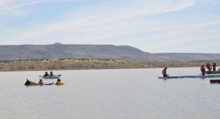 One canoe sinks before it can start the race.