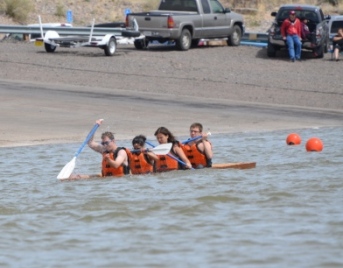 One of the canoes rides low in the water