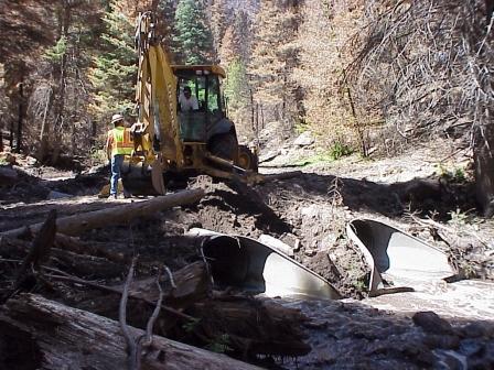 Clean up in Santa Clara Canyon after flooding 